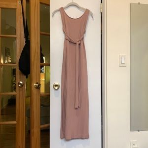 Small light pink Cuyana dress that can be wrapped a variety of ways.